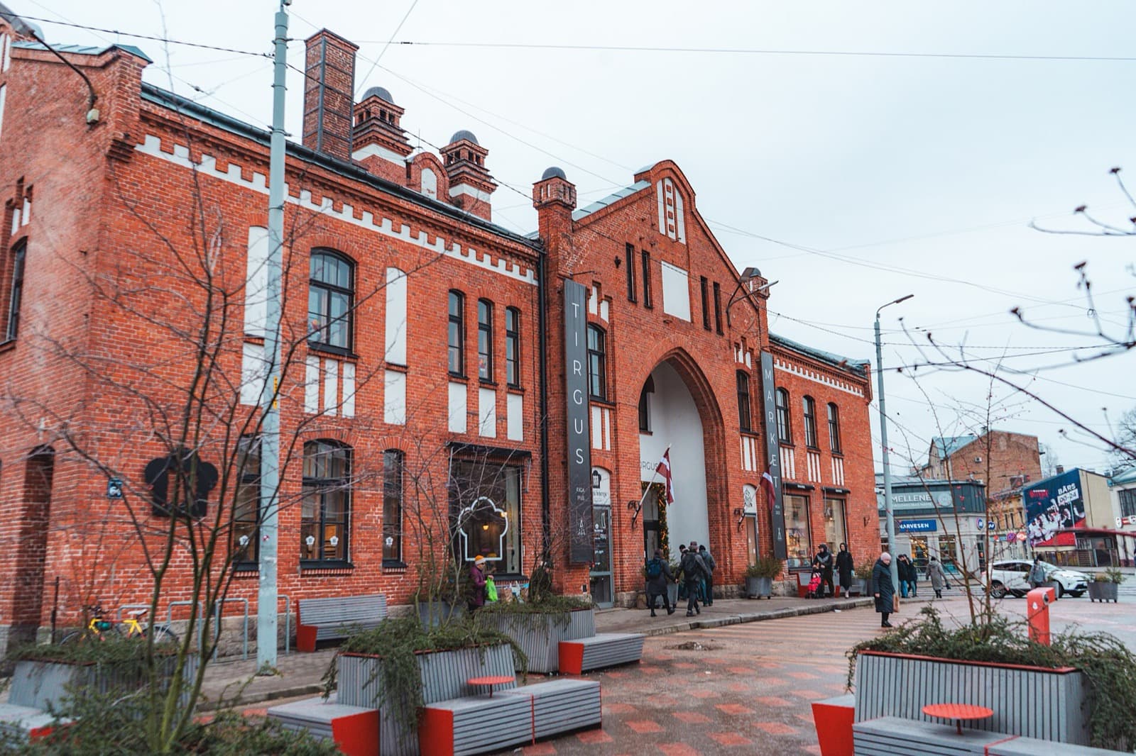 The red-brick Āgenskalns Market hall, the everyday heart of the wooden Pārdaugava district.