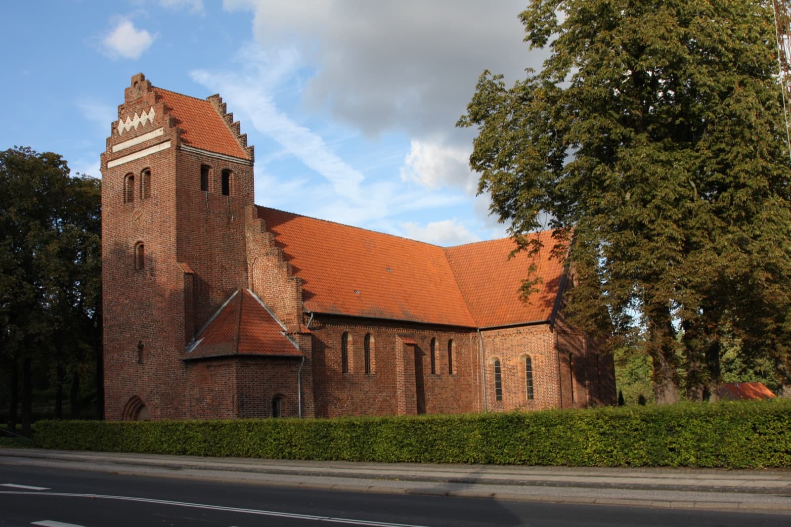 The medieval red-brick Dalum Church with its stepped gable in Dalum, a southern district of Odense.