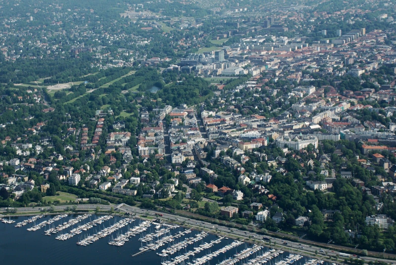 Aerial view over Frogner in Oslo, with the Frognerkilen marina in the foreground and Frogner Park on the left.