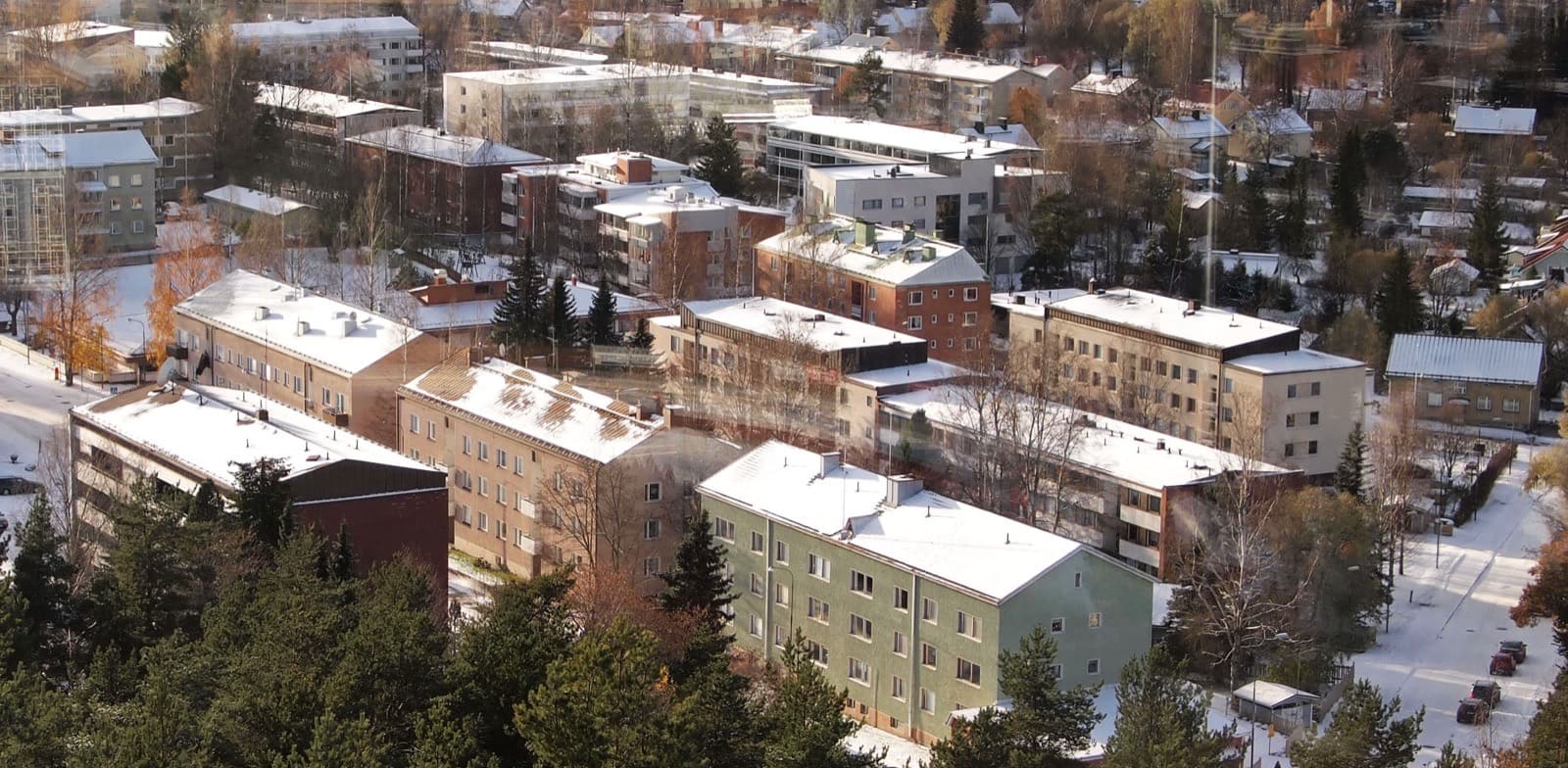 The 1950s apartment blocks of Mäki-Matti in Jyväskylä under fresh snow, seen from the Vesilinna tower on the Harju ridge.