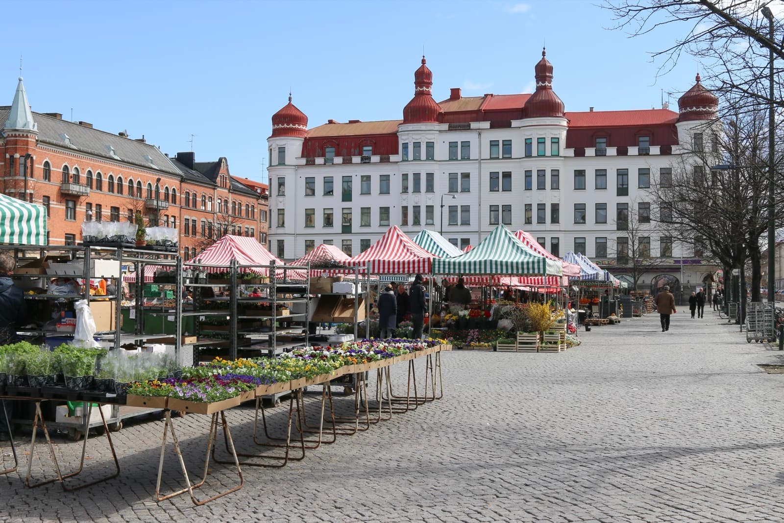 Möllevångstorget market square with the 1907 corner building behind it in the Möllevången district of Malmö, Sweden.
