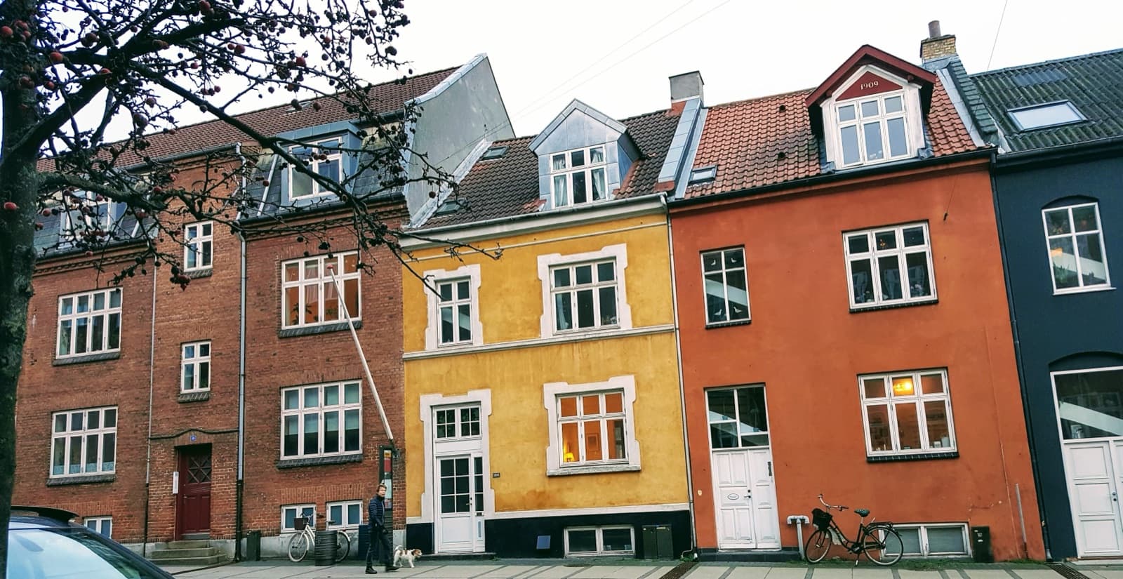 A row of colourful brick and plastered townhouses on Tordenskjoldsgade in the Trøjborg district of Aarhus.
