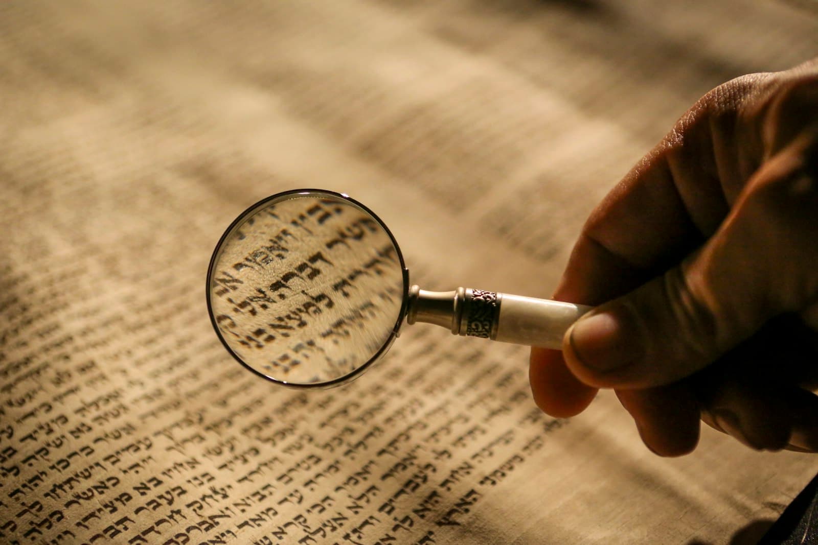 A magnifying glass held over a printed document