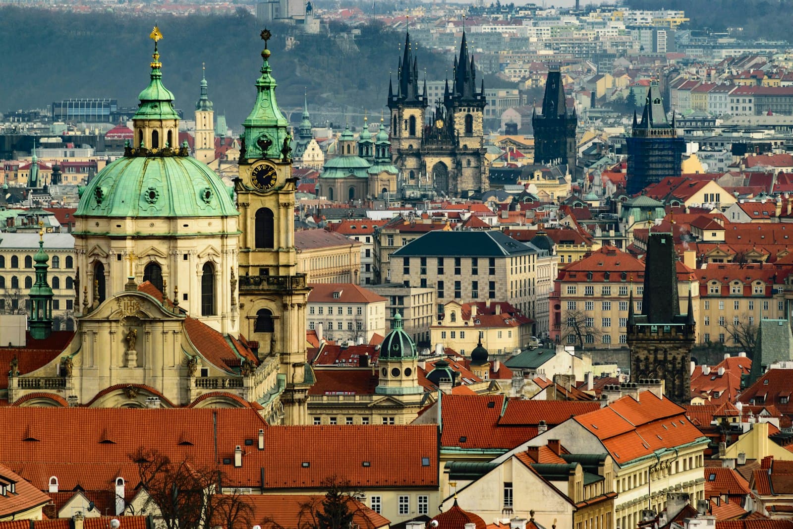 The rooftops and spires of Prague seen from above